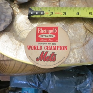 Four 1969 world champion Mets beer coasters