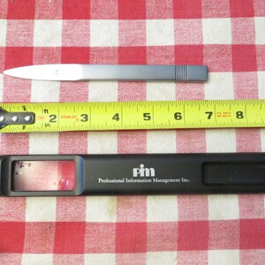 Magnifier stainless letter opener,  PIM, Aachen Germany Design Int. Pat.