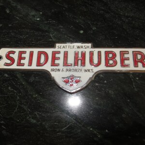 1930’s Seattle Seidelhuber Iron & Bronze  Works Emblem