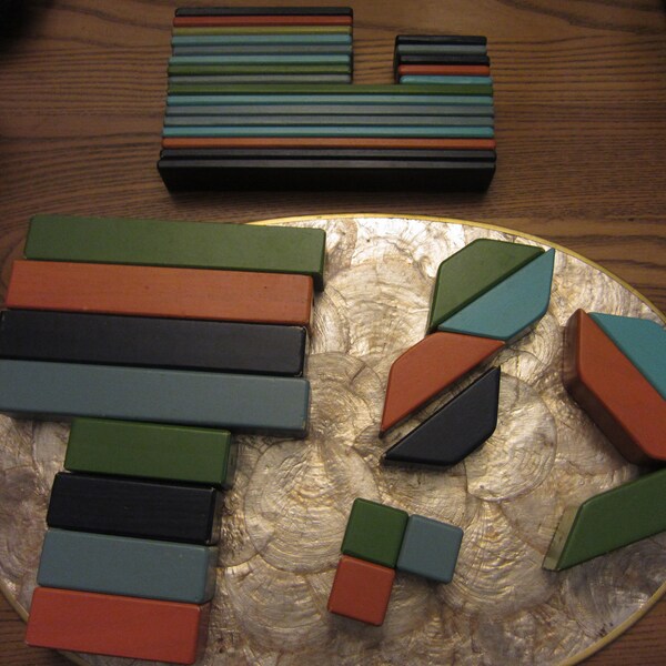 Ensemble de 39 blocs en bois magnétiques Tegu, teintes classiques, bon état