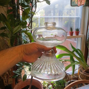 Clear glass oil lamp part font replacement.