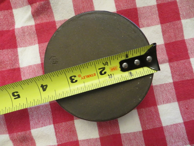 Pin Cushion with Ceramic Base.