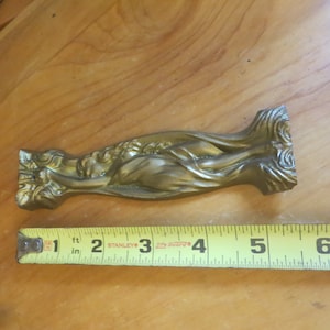 Antique gilt bronze furniture embellishment with art nouveau lady.