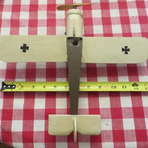 Vintage handmade wood airplane, single engine prop