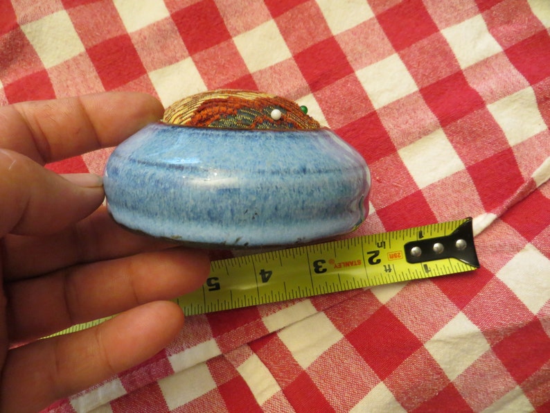 Pin Cushion with Ceramic Base.