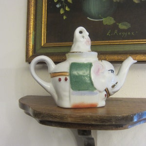Elephant teapot, pottery, vintage