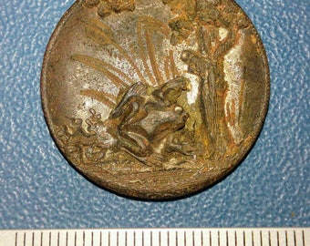 Vintage brass button of the 19th century