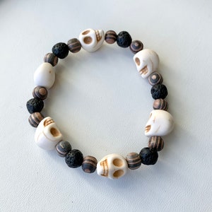 Skull Stretch Bracelet with Howlite Skulls, Matte Tiget Eye, and Lava Rock Beads - Extra Large