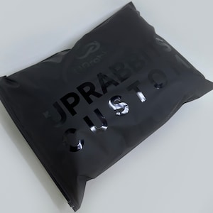 Bolsas de plástico negro mate personalizadas con cierre deslizante para ropa, bolsa con cierre con impresión de logotipo UV esmerilado, bolsa con cierre para ropa