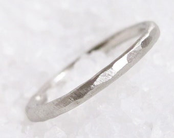 Hand-forged platinum, hammered wedding ring.