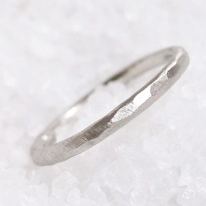 Hand-forged platinum, hammered wedding ring.