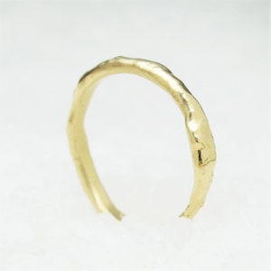 Minimal faith wedding ring cast gold