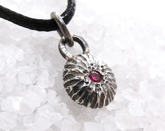 Delicate pendant in raw silver with ruby, small round precious stone charm