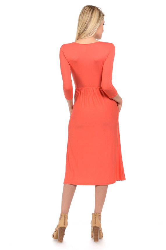 Coral fit and flare dress top