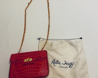 Retta Wolff Red Purse compartments for all your needs. Please see last photo- a reputable tailor will be able to stitch the fabric on strap.