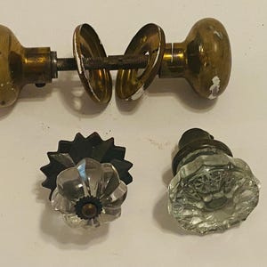 Authentic 1940 Door Hardware. Original Brass Passage Door Knob, One Crystal Door Knob from the 1940’s. One crystal drawer pull.