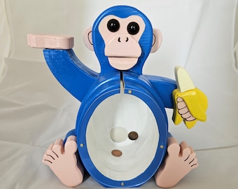 Monkey bank made from solid wood in blue, pink and yellow