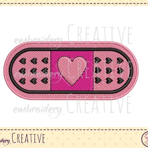 May include: Pink fabric bandage with a pink heart in the center and black hearts around the edges. The bandage is a digital embroidery design.
