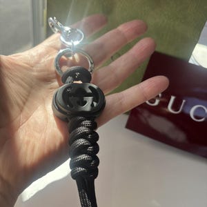 May include: A rustic wooden sign with the text "Welcome to our home" in white lettering. The sign features a distressed finish and a simple, inviting design, perfect for a front porch or entryway.