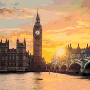 Può includere: Una vista panoramica delle Case del Parlamento e del Big Ben a Londra, in Inghilterra, al tramonto. L'iconica torre dell'orologio è illuminata dalla luce dorata del sole al tramonto, che si riflette nel Tamigi.