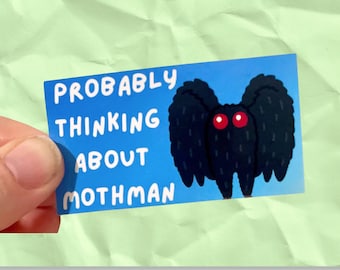 Probably thinking about Mothman cute cryptid vinyl sticker