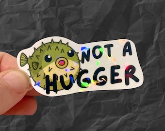 Holographic not a hugger puffer fish vinyl water resistant sticker