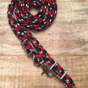 Red, black, and black and white reins