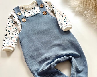 Dungarees blu con corpo e bava