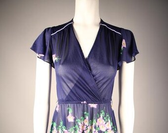 jaren 1970 navy bloemen Print jurk