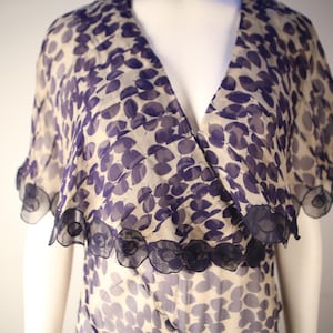 1930's printed chiffon bias cut dress with leaf motifs and circle scallop applique artwork on the collar.