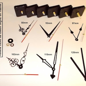 May include: Assortment of clock hands in various styles and sizes. The hands are black with gold accents. The measurements of each hand are noted in millimetres.