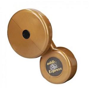 May include: Gold-colored yarn holder with a black button and the text "addi-Express" on the side.