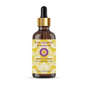 May include: A brown glass bottle of "Pure Labdanum Essential Oil" with a black dropper and gold cap. The label is yellow with a floral design and the text "déve herbes". The bottle contains a clear liquid.