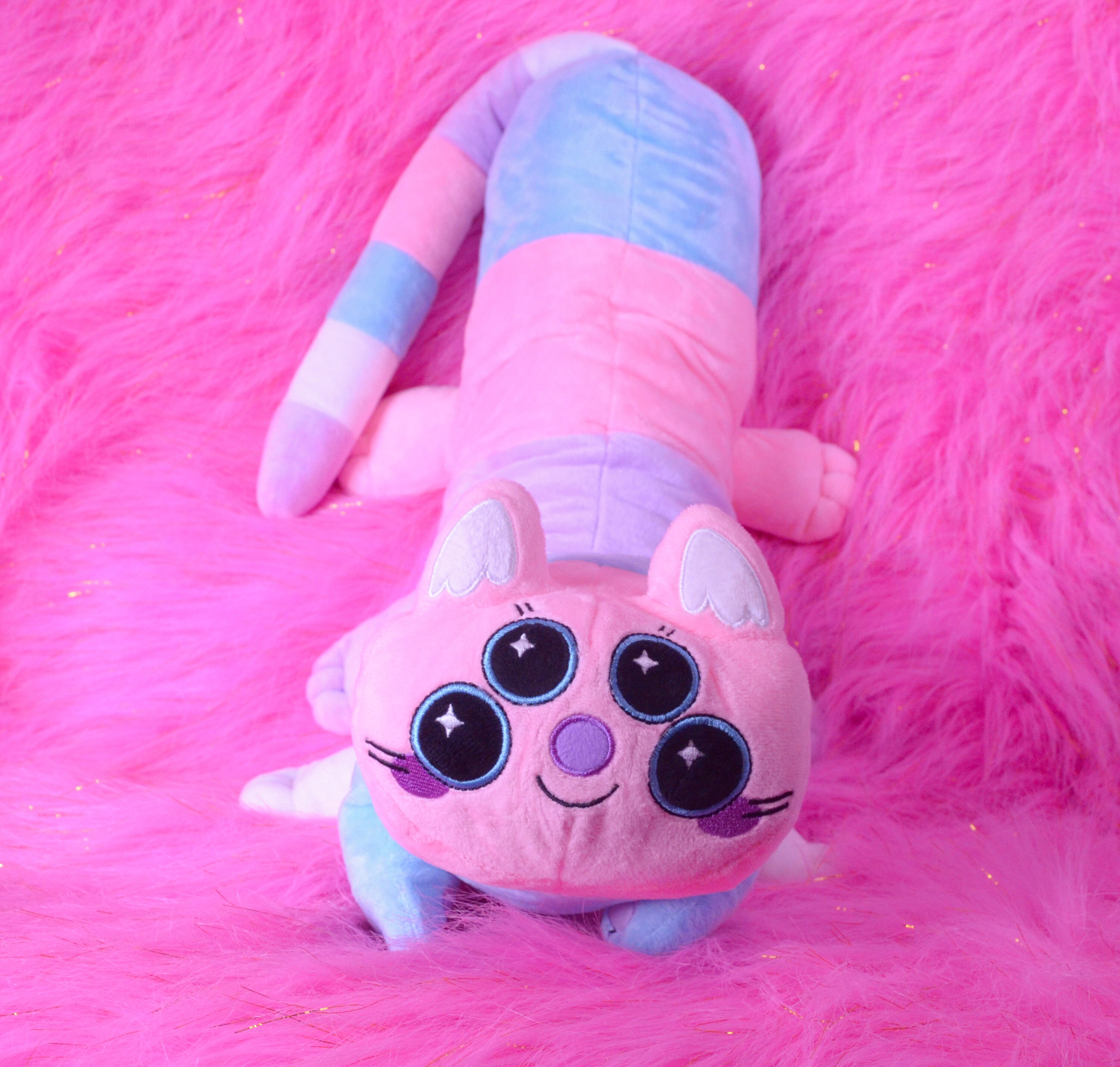 Woogler the Space Cat plush cotton candy color