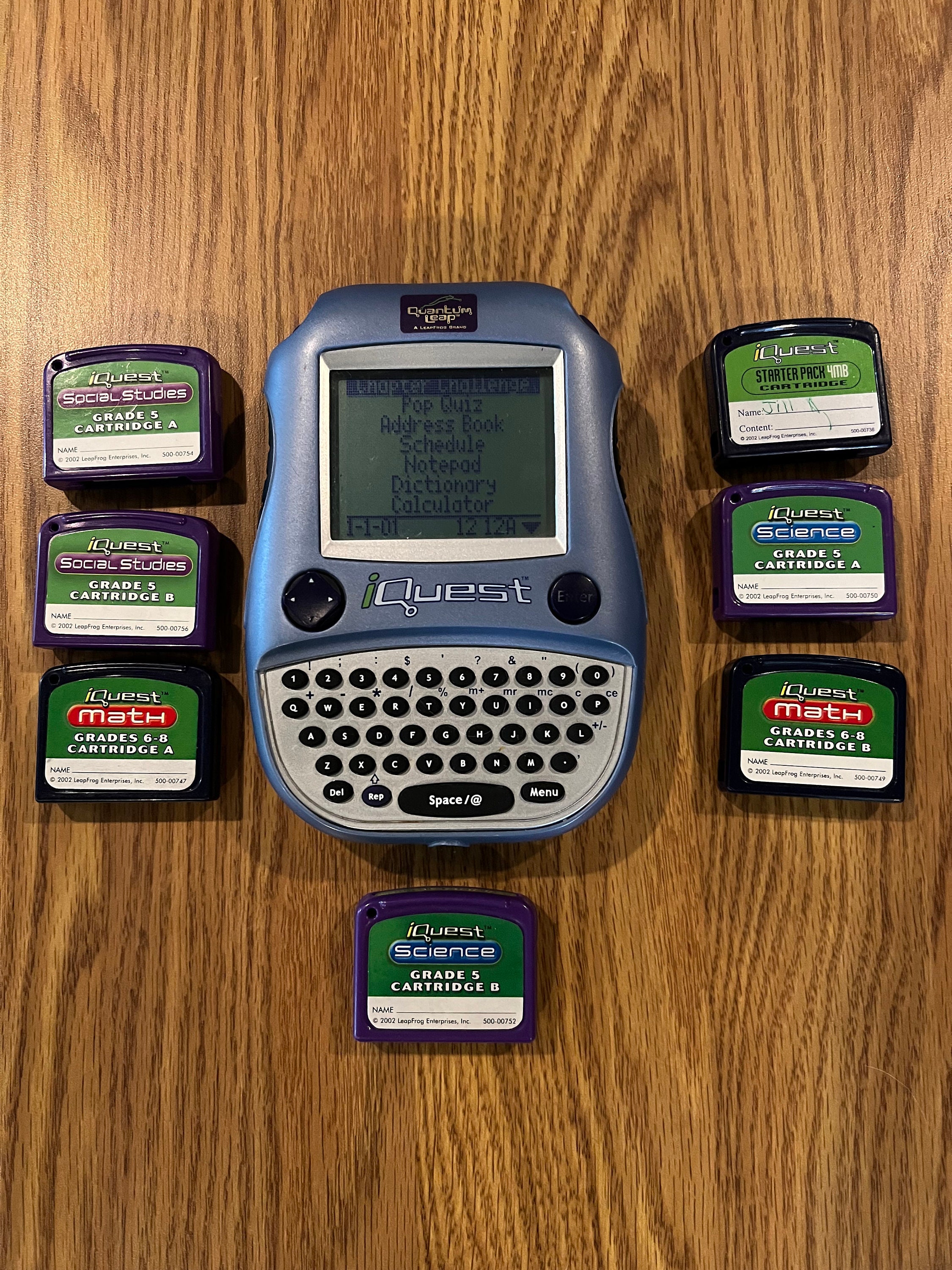 Leapfrog Iquest Quantum Leap Handheld Learning System Grades 5-8 Includes 7  Cartridges 