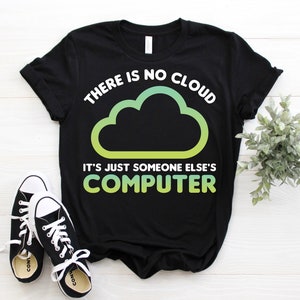May include: Black t-shirt with a green and yellow gradient cloud graphic and the text "There is no cloud. It's just someone else's computer."