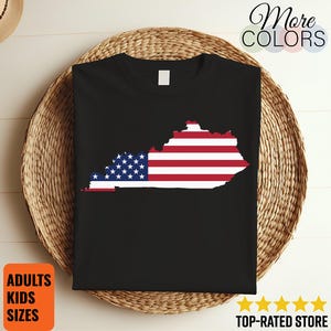 May include: A black short-sleeved t-shirt featuring a graphic of the state of Kentucky filled with the American flag pattern, displaying a blue field with white stars on the left and red and white horizontal stripes on the right side.