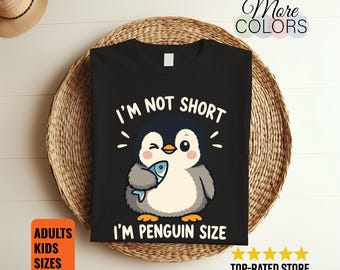 I'm Not Short Penguin Size Shirt, Funny Height Humor Tee, Cute Bird Holding Fish Graphic, Animal Lover Gift, Winking Cartoon Birthday Outfit