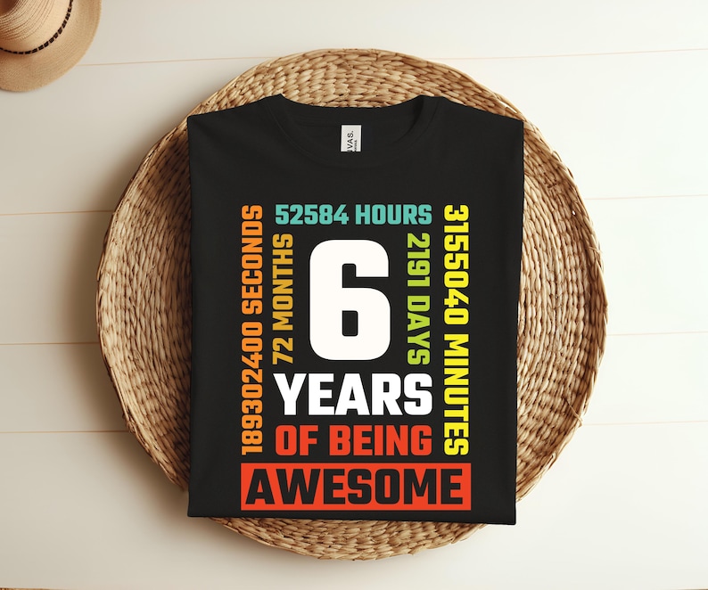 May include: Black t-shirt with colorful text that reads "189302400 Seconds, 72 Months, 52584 Hours, 2191 Days, 3155040 Minutes, 6 Years of Being Awesome".