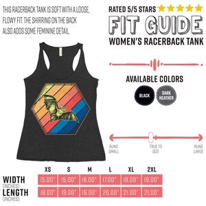 May include: Dark heather racerback tank top with a bat graphic inside a retro-style hexagon. The tank top has the text "FIT GUIDE WOMEN'S RACERBACK TANK" and is available in black and dark heather. Width measurements range from 15.00" to 19.00".