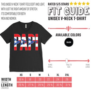 May include: Black unisex V-neck t-shirt with the word "PAPI" in red, white, and blue. The shirt features a fit guide and size chart with measurements in inches. Available in black, the shirt is designed for comfort and stretch.