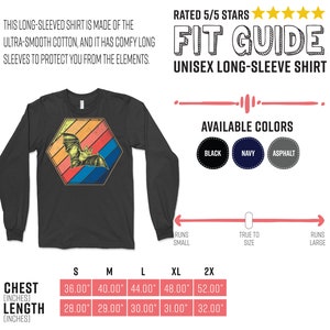 May include: Dark gray unisex long-sleeve shirt with a bat graphic inside a retro-style hexagon. The shirt has long sleeves and is made of ultra-smooth cotton. Available in black, navy, and asphalt. Chest sizes range from 36" to 52".