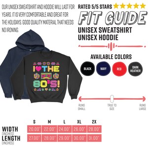 Puede incluir: Sudadera unisex negra con un estampado gr&aacute;fico de un coraz&oacute;n con el texto "I &hearts; THE 80'S!" en letras de colores y una cinta de casete retro. La tabla de tallas muestra el ancho y la longitud en pulgadas para las tallas S, M, L, XL y 2X. La sudadera est&aacute; disponible en negro, azul marino, rojo y gris oscuro.