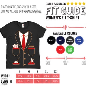 K&ouml;nnte beinhalten: Schwarzes Damen-T-Shirt mit einem Aufdruck eines Dirigentenanzugs, einschlie&szlig;lich roter Krawatte, Taschen und dem Wort "CONDUCTOR". Erh&auml;ltlich in verschiedenen Farben. Breiten von 43,8 bis 64,1 cm.