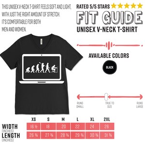 May include: Black unisex V-neck t-shirt with a white graphic of human evolution inside a laptop screen. The shirt includes the text "FIT GUIDE UNISEX V-NECK T-SHIRT" and "AVAILABLE COLORS BLACK". Measurements are provided in inches, with equivalent cm measurements.