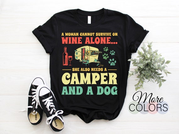 A Woman Cannot Survive On Wine Alone Camper And A Dog T-Shirt A Woman Cannot Survive On Wine Alone Camper And A Dog T-Shirt