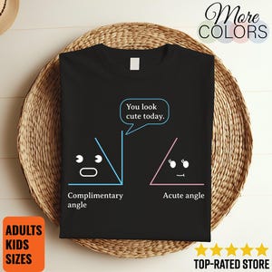 May include: A black t-shirt featuring a graphic of two triangles with faces. One blue triangle is labeled 'Complimentary angle' and the other pink triangle is labeled 'Acute angle'. The blue triangle has a speech bubble that says 'You look cute today.'
