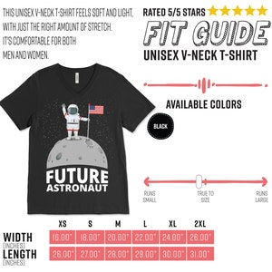 May include: Black unisex V-neck t-shirt with a graphic of an astronaut on the moon holding an American flag. The shirt has the text "FUTURE ASTRONAUT" and is available in black. Width measurements range from 16.00" to 26.00". Length measurements range from 26.00" to 31.00".