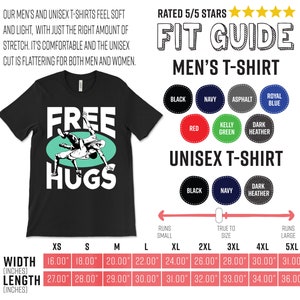 May include: Black t-shirt with a green circle and white text that says "FREE HUGS". The graphic shows two people wrestling. A size chart shows the width and length in inches for different sizes of men's and unisex t-shirts.