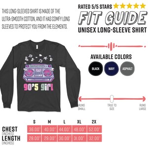 May include: Dark gray unisex long-sleeve shirt with a retro boombox graphic and the text "90's girl". The shirt is made of ultra-smooth cotton. Available in black, navy, and asphalt. Chest sizes range from 36" to 52". Lengths range from 28" to 32".
